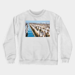 Wooden piles off Princess Pier, Melbourne. Crewneck Sweatshirt